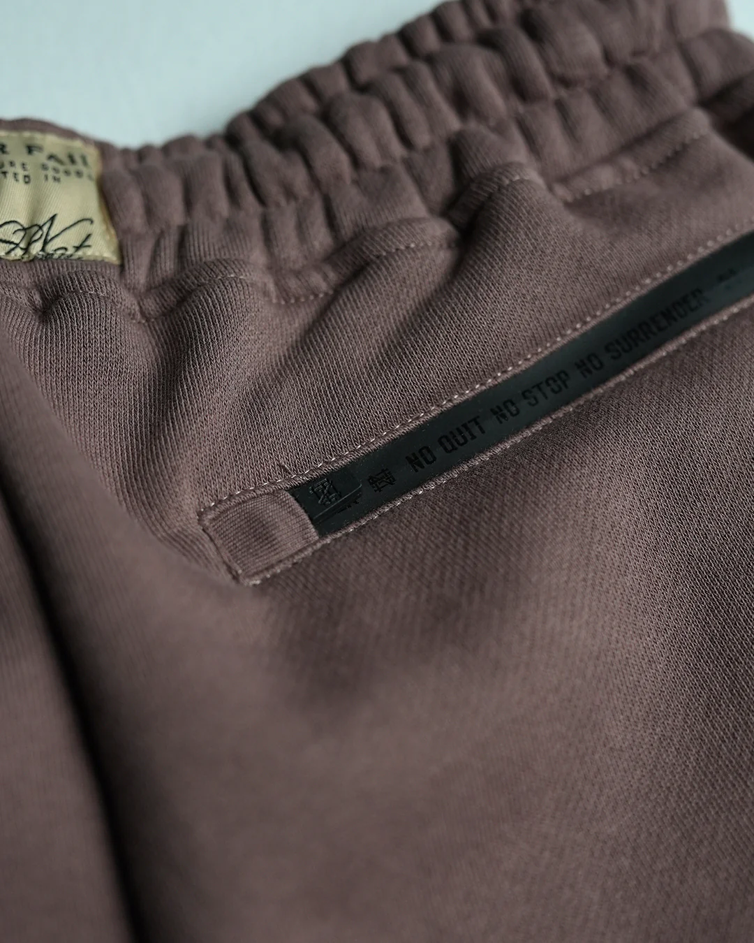 EMBOSSED FITTED JOGGERS-EARTH - Image 6