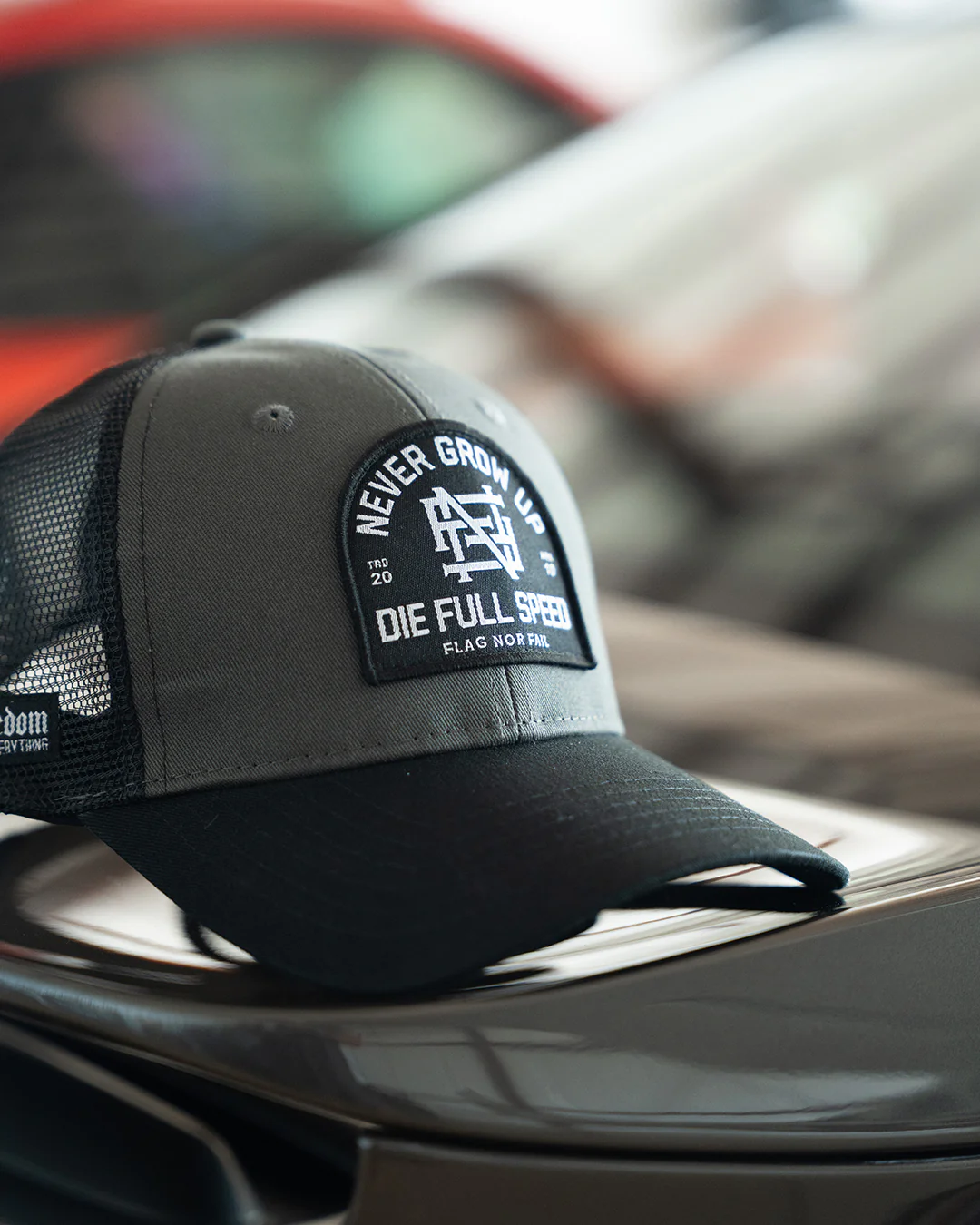 NEVER GROW UP TRUCKER HAT - BLACK - Image 4